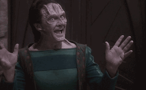 Elim Garak from Deep Space 9 doing jazz hands