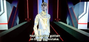 screenshot from TRON 1982. Clu 1 has been captured and is being interrogated by the MCP. He says: No, I must have gotten in there by mistake!