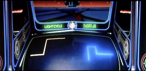 the Lightcycle game machine as the game is played at the start of the film