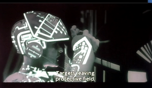 Tank program preparing to fire on the escapees, saying: Targets leaving protective field.