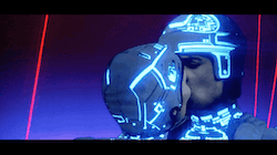 a short, slowed-down gif of the kiss between Tron and Yori at the end of the 1982 film, ending on Tron's surprised face immediately after