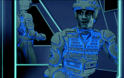 Ram, Tron's seductive twinky little cellmate in TRON 1982, turning to look at Tron over his shoulder and giggling adorably