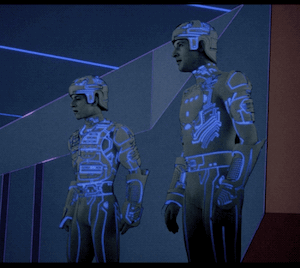 Ram and Tron (TRON 1982) standing next to each other in the energy pool cavern