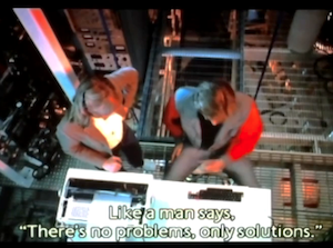 Kevin Flynn logging into the computer in the laser bay: Tron, 1982. Closed caption: "Like a man says, There's no problems, only solutions."
