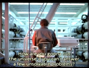 Kevin Flynn chatting with the Master Control Program: Tron, 1982. Closed caption: "How are you gonna run the universe if you can't answer a few unsolvable problems?"