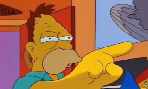 The well-known Simpsons meme It'll Happen To You. Grandpa Abe points threateningly, not unlike the grim reaper appearing before Ebeneezer Scrooge to gesture silently at his future gravestone. A dark reminder of the inevitability of the passage of time. You may be young now, but this agony too awaits you.